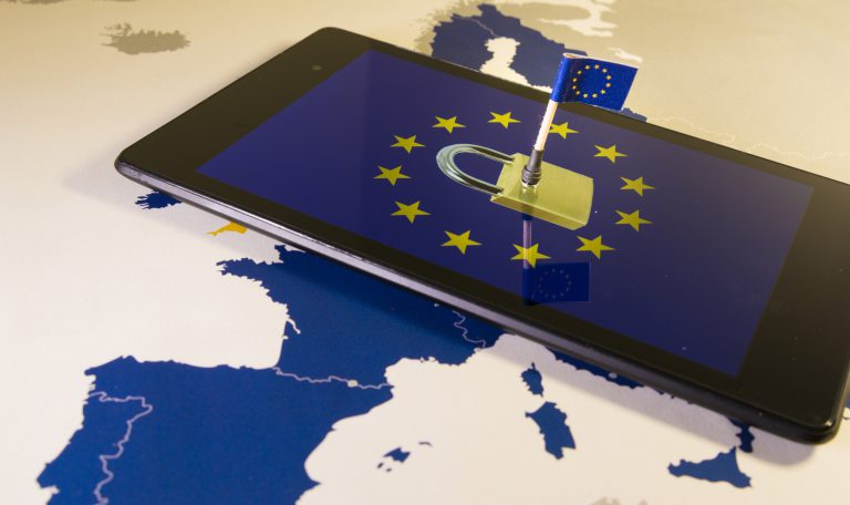 Padlock and EU flag inside smartphone and EU map, symbolizing the EU General Data Protection Regulation or GDPR. Designed to harmonize data privacy laws across Europe.