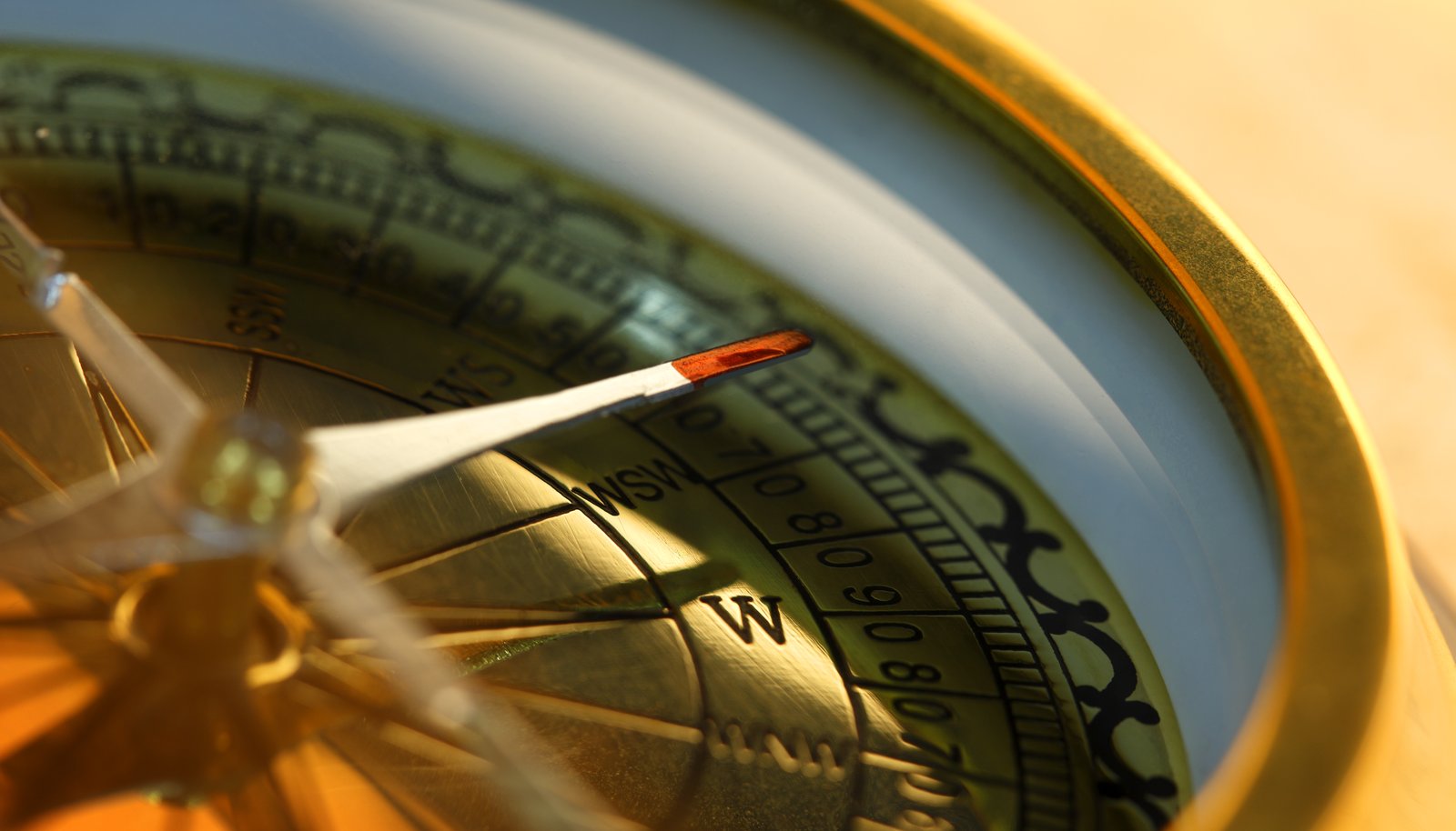 An antique brass compass, representing navigating the Pardot roadmap decision deliberately